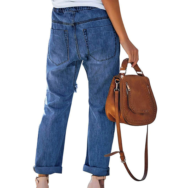 Women's casual destroyed denim jogger with elastic drawstring waistband and patch front pockets Mune Fashion