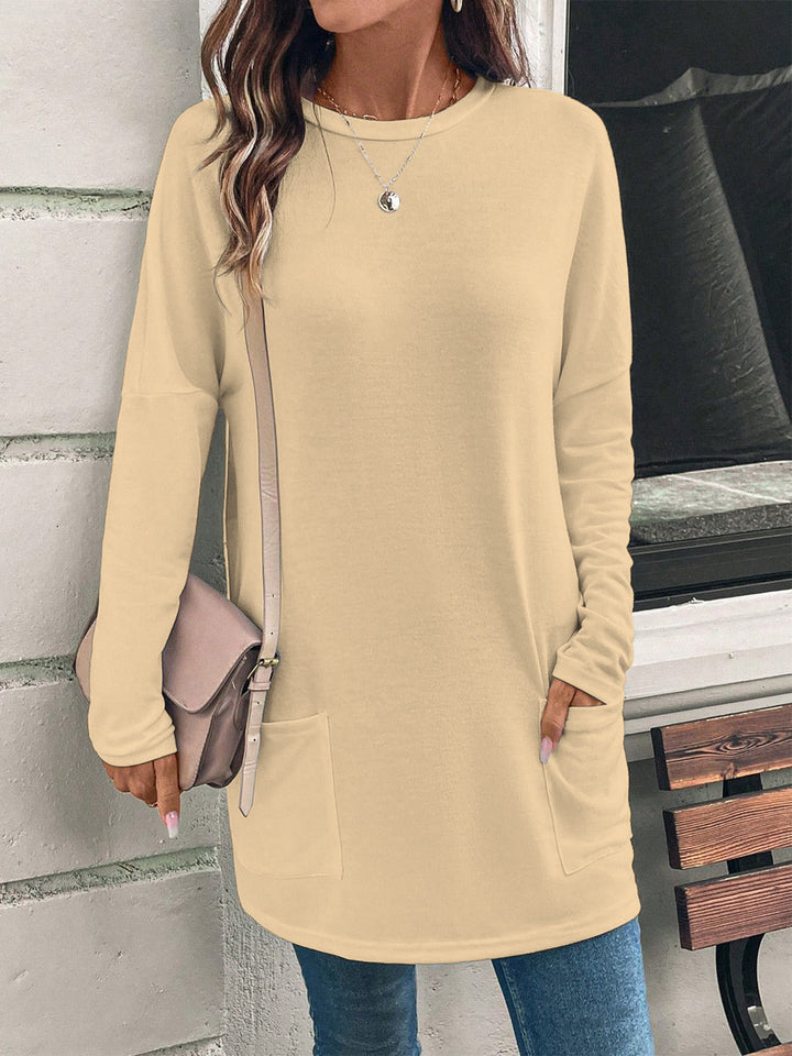 Women's loosely cut long tunic with round neckline, side pockets, and soft jersey Mune Fashion