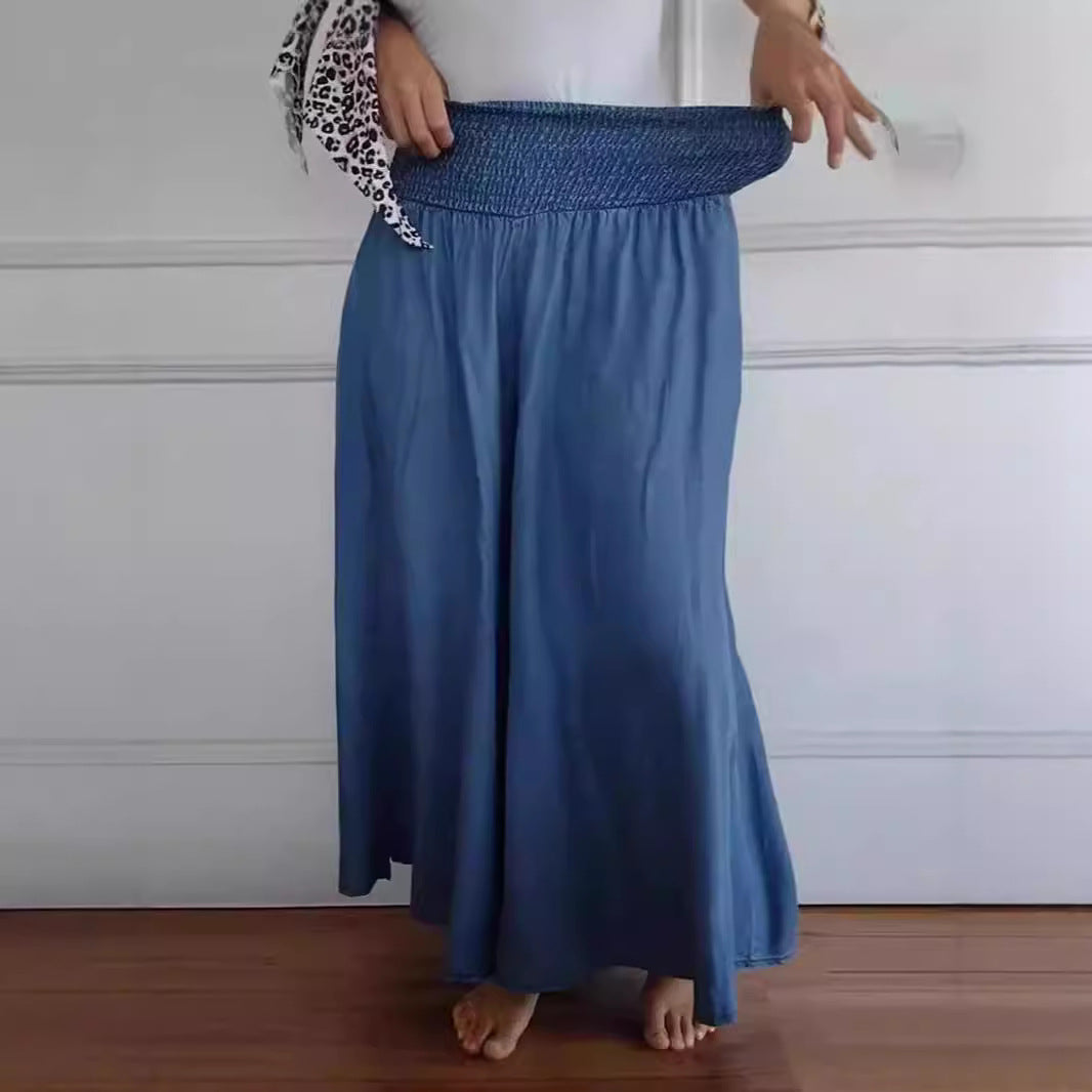 Women's maxi skirt with high smock waistband, wide fall and side pockets Mune Fashion