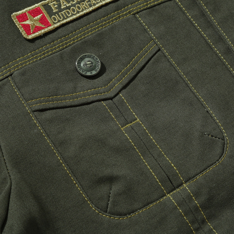 Men's robustly crafted canvas work jacket with breast flaps, inner seam lining, and badge details Mune Fashion