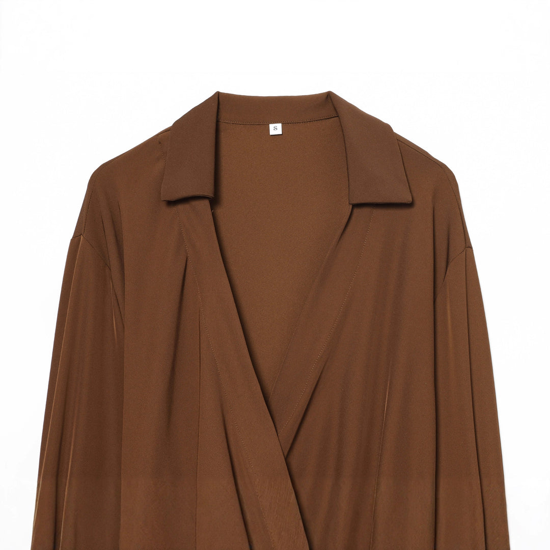 Women's flowing wrap blouse with wide lapel collar, dropped shoulder, and decorative side tie Mune Fashion