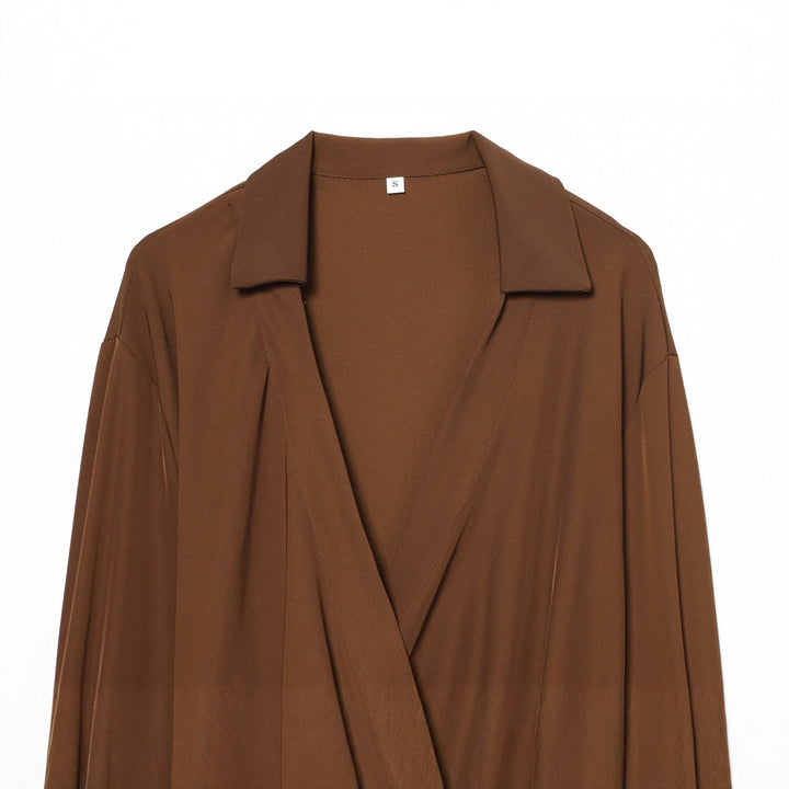 Women's flowing wrap blouse with wide lapel collar, dropped shoulder, and decorative side tie Mune Fashion