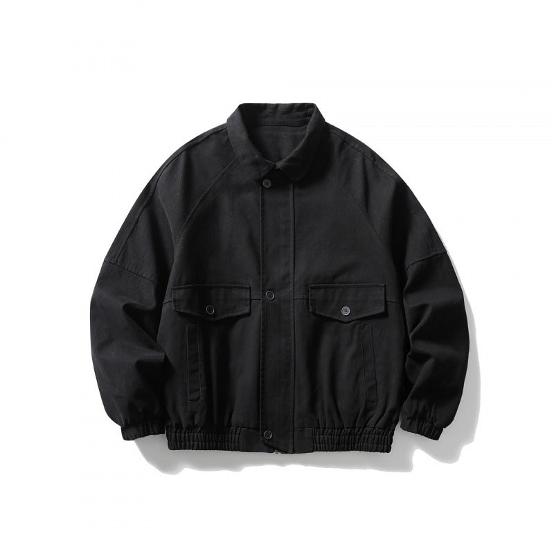 Unisex short-cut boxy jacket made of denim with elastic hem and flap pockets Mune Fashion