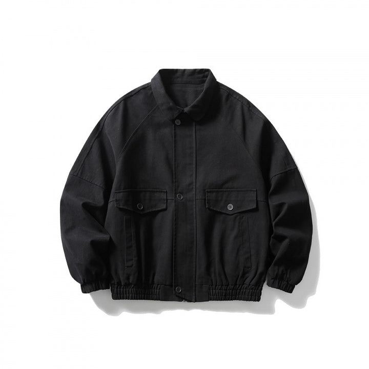 Unisex short-cut boxy jacket made of denim with elastic hem and flap pockets Mune Fashion