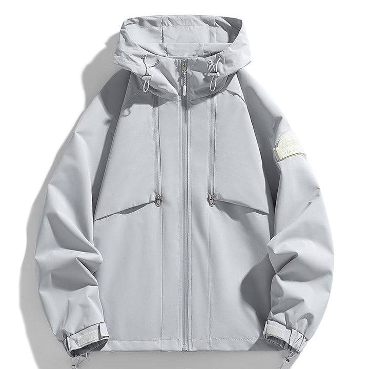 Unisex Lightweight two-tone wind and rain jacket with hood, drawstring and zip pockets Mune Fashion