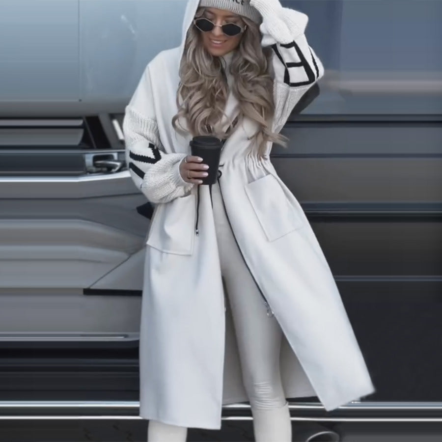 Women’s hooded coat with oversized cut, knitted sleeve cuffs and patch pockets Mune Fashion