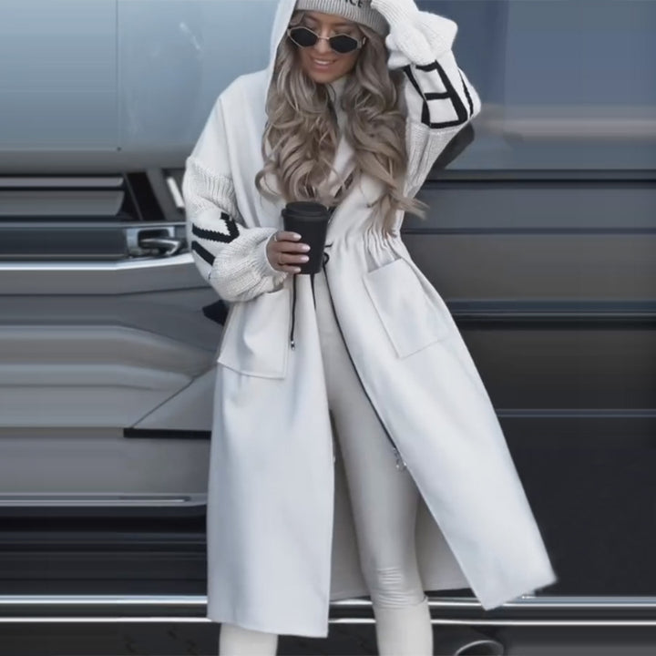 Women’s hooded coat with oversized cut, knitted sleeve cuffs and patch pockets Mune Fashion