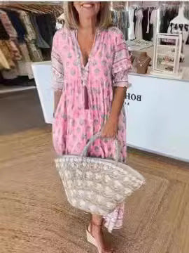 Women Boho Maxi Dress made of lightweight viscose blend with V-neck, tassel tie, three-quarter sleeves, and side pockets Mune Fashion