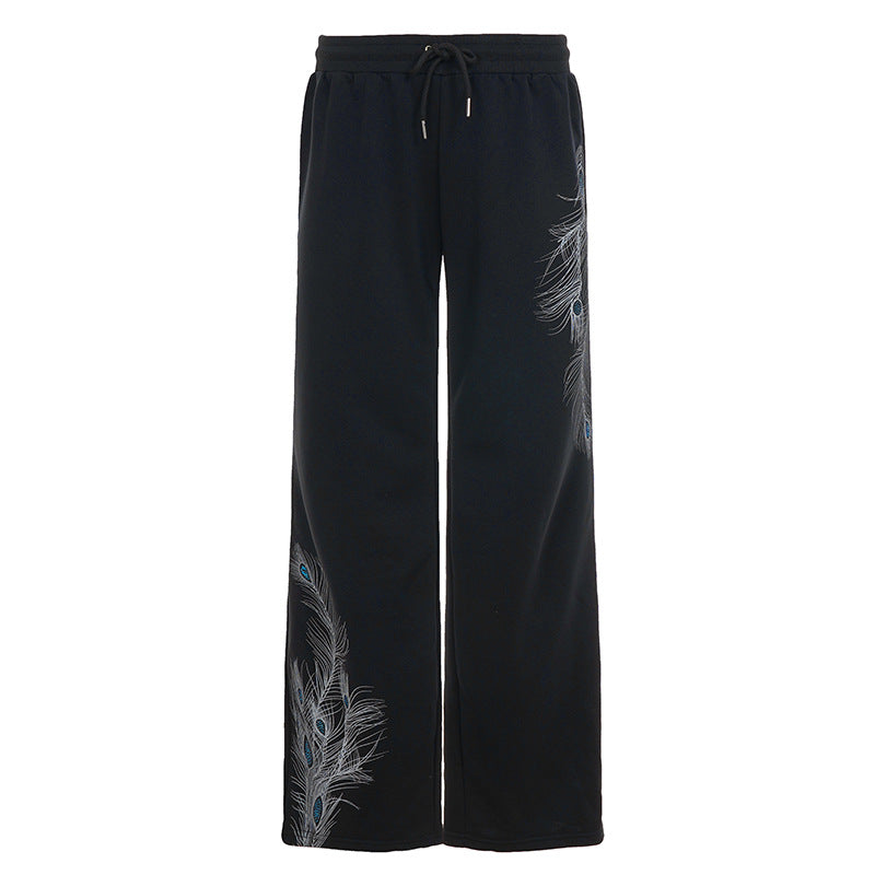 Ladies' wide lounge pants with drawstring, high comfort waistband and peacock feather print Mune Fashion