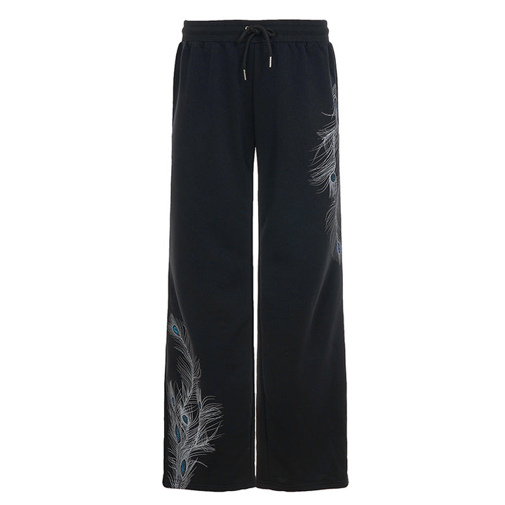 Ladies' wide lounge pants with drawstring, high comfort waistband and peacock feather print Mune Fashion
