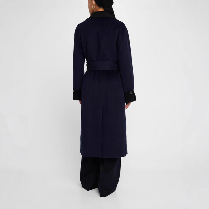 Women's tailored wool blend coat with tie belt, contrast lapel and flap pockets Mune Fashion