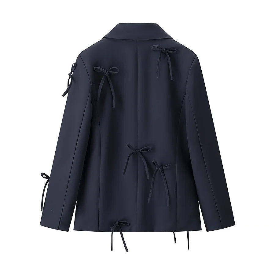Women's tailored blazer with decorative bow appliqués and classic button placket Mune Fashion