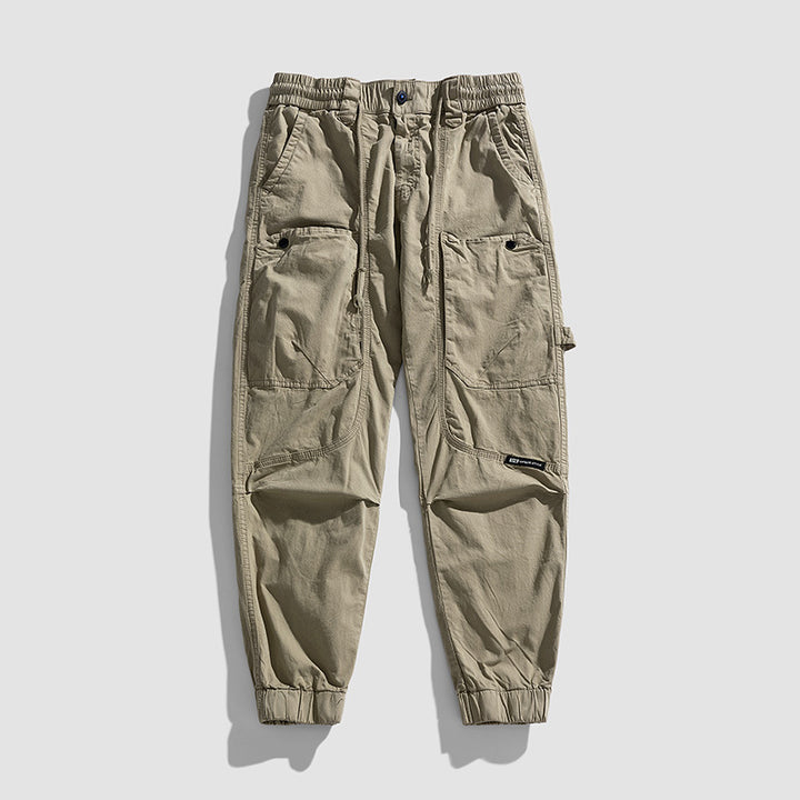 Herren Konisch geschnittene Utility-Cargohose mit Tunnelzugbund, Kniepaneelen und Knöchelbündchen Mune Fashion