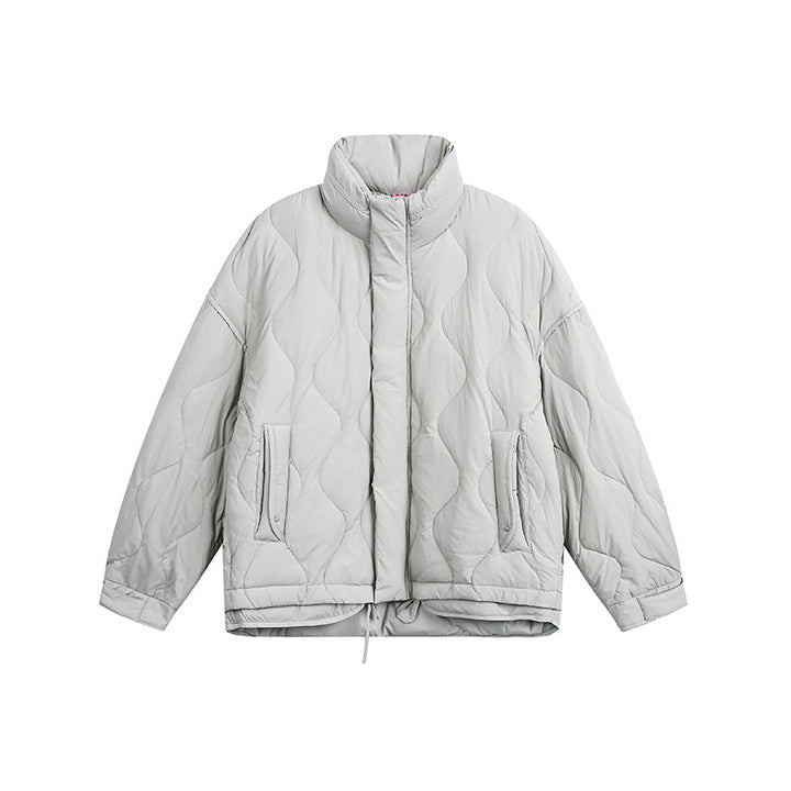 Women's oversized quilted jacket with stand-up collar, wave quilting, and drawstring hood