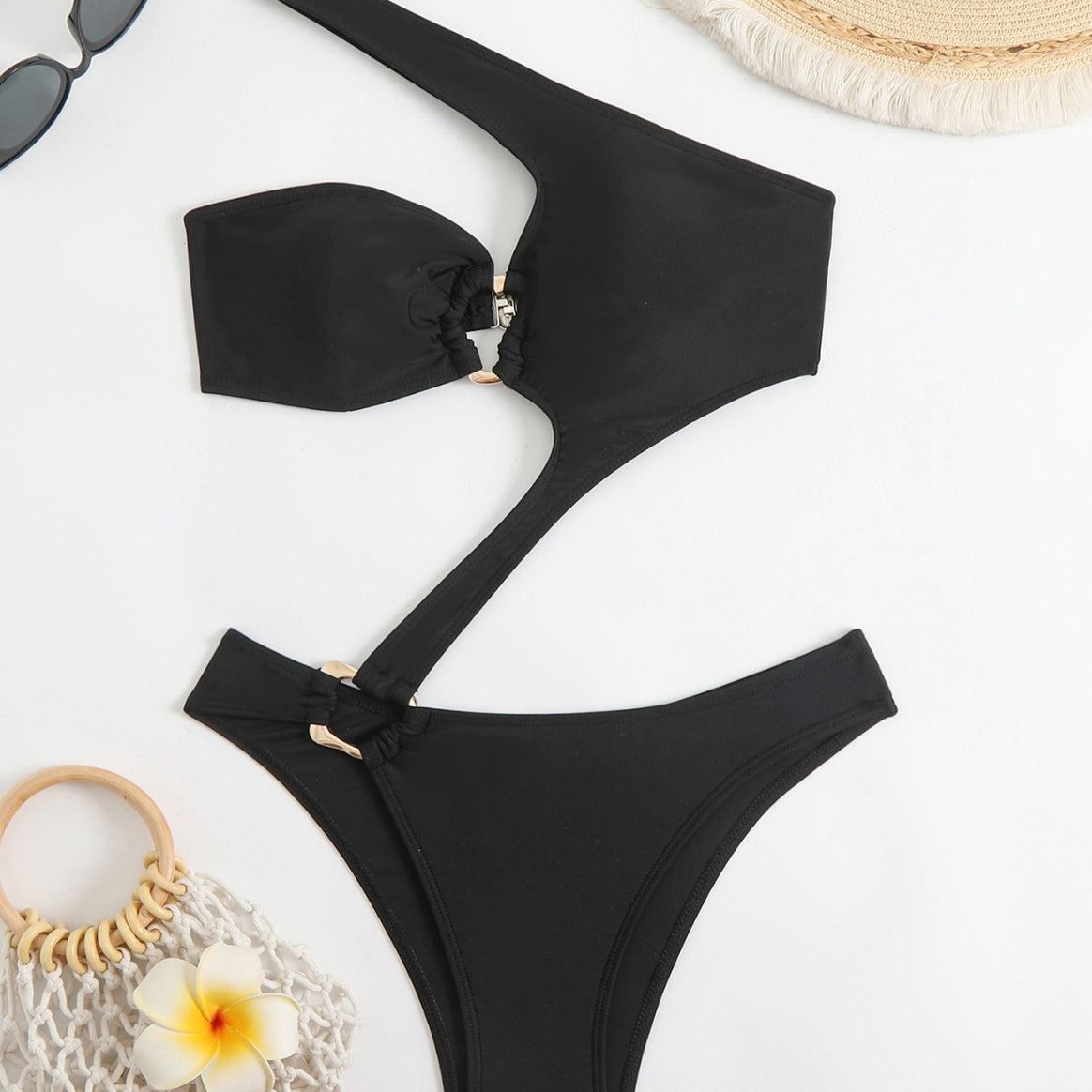 Women's one-piece swimsuit with asymmetrical cut and decorative knot Mune Fashion