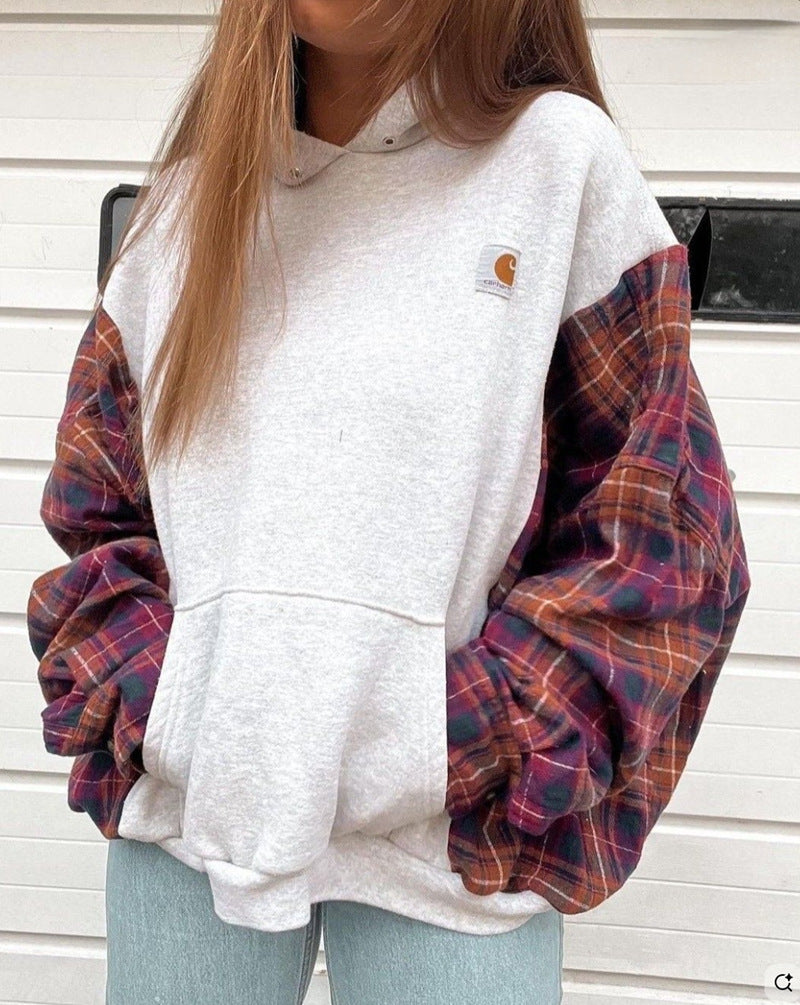 Women's oversized hoodie with checkered flannel sleeves and kangaroo pocket Mune Fashion