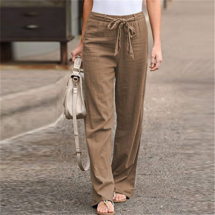 Women's loose linen pants with drawstring waistband, straight leg and side pockets Mune Fashion