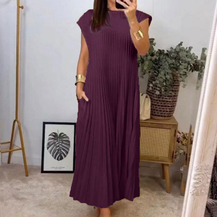 Women's flowing pleated maxi dress with dropped shoulders and side pockets Mune Fashion