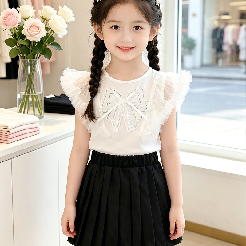 Girls T-shirt with elegant ruffle hems and bow motif Mune Fashion
