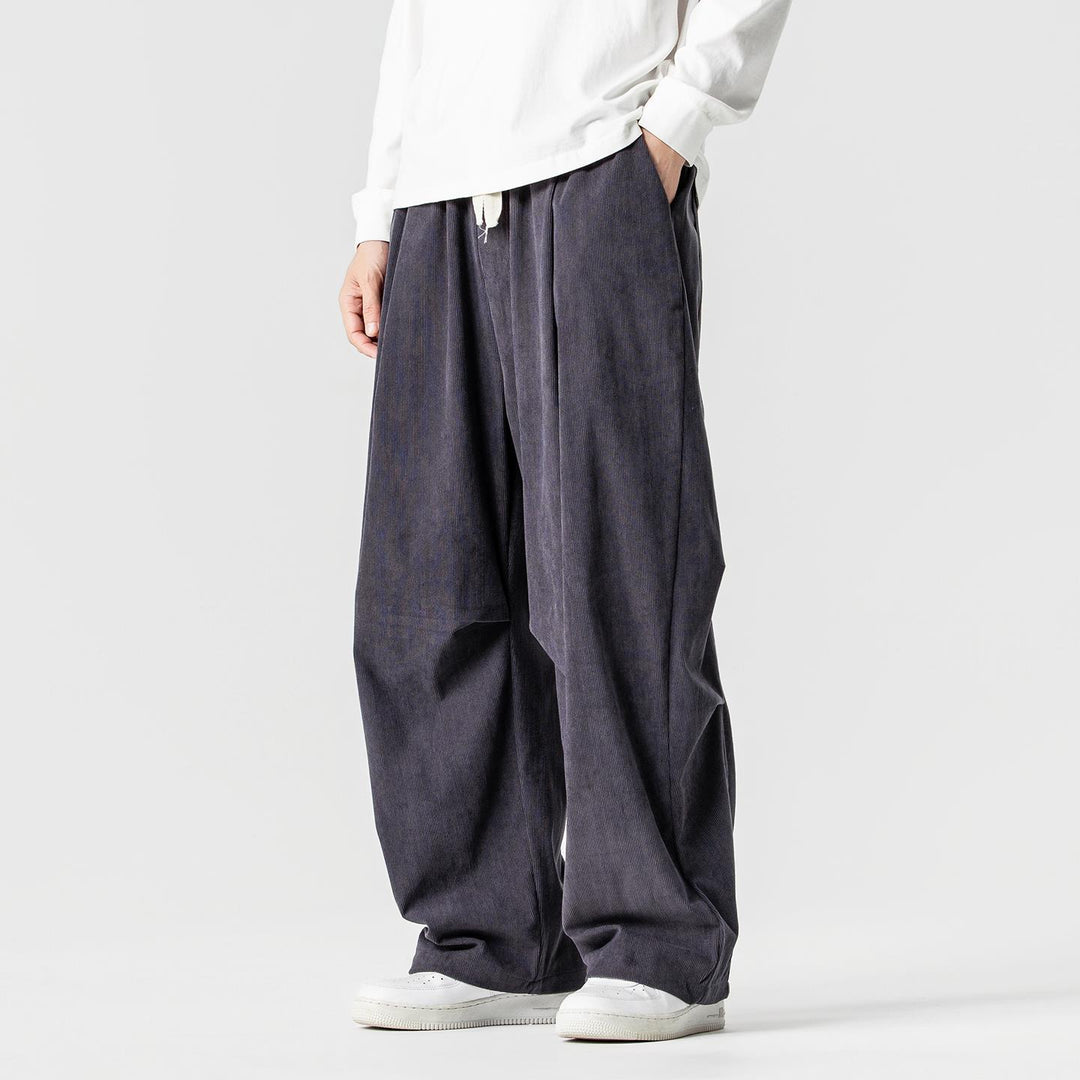 Men's wide-cut corduroy pants with pleats, drawstring, and casual baggy silhouette Mune Fashion
