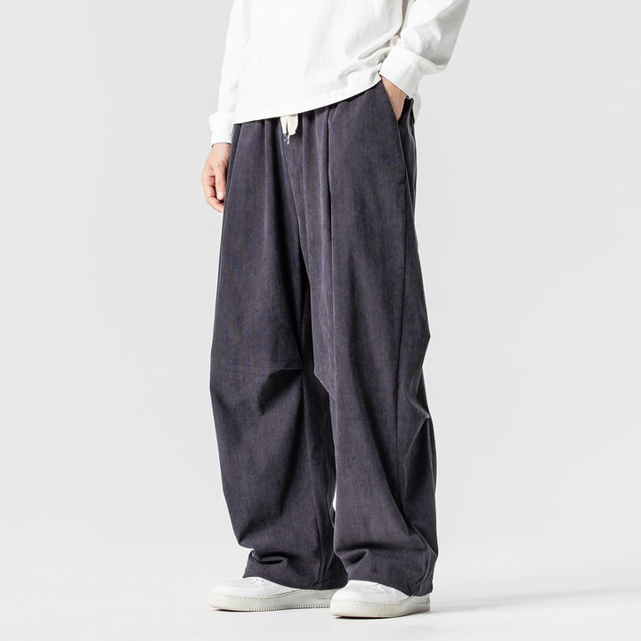 Men's wide-cut corduroy pants with pleats, drawstring, and casual baggy silhouette Mune Fashion