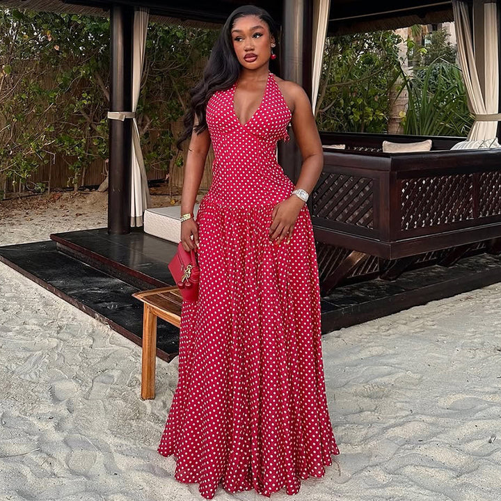 Ladies long halter dress with deep V-neck, tailored empire seam and flared layered skirt Mune Fashion