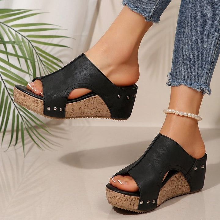 Women’s wedge sandals with heel strap, ergonomic footbed, cork look platform, and padded toe area Mune Fashion