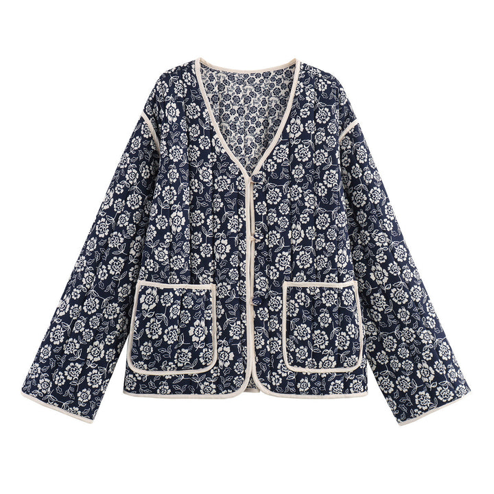 Ladies quilted jacket with floral allover, V-neck, contrast piping and patch pockets Mune Fashion