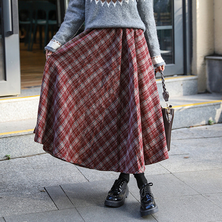 Women's flared checked midi skirt with a full drape and elasticated comfort waistband.