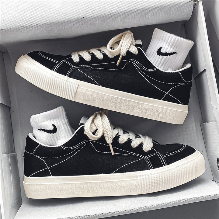 Unisex casual canvas low-top sneaker with contrasting decorative stitching and padded platform sole Mune Fashion