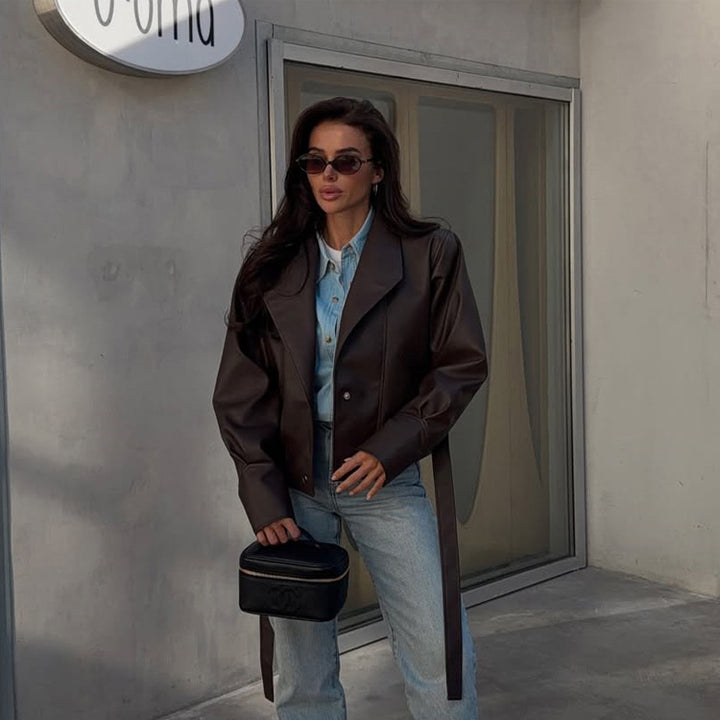 Women’s short blazer made of vegan leather with waist belt Mune Fashion