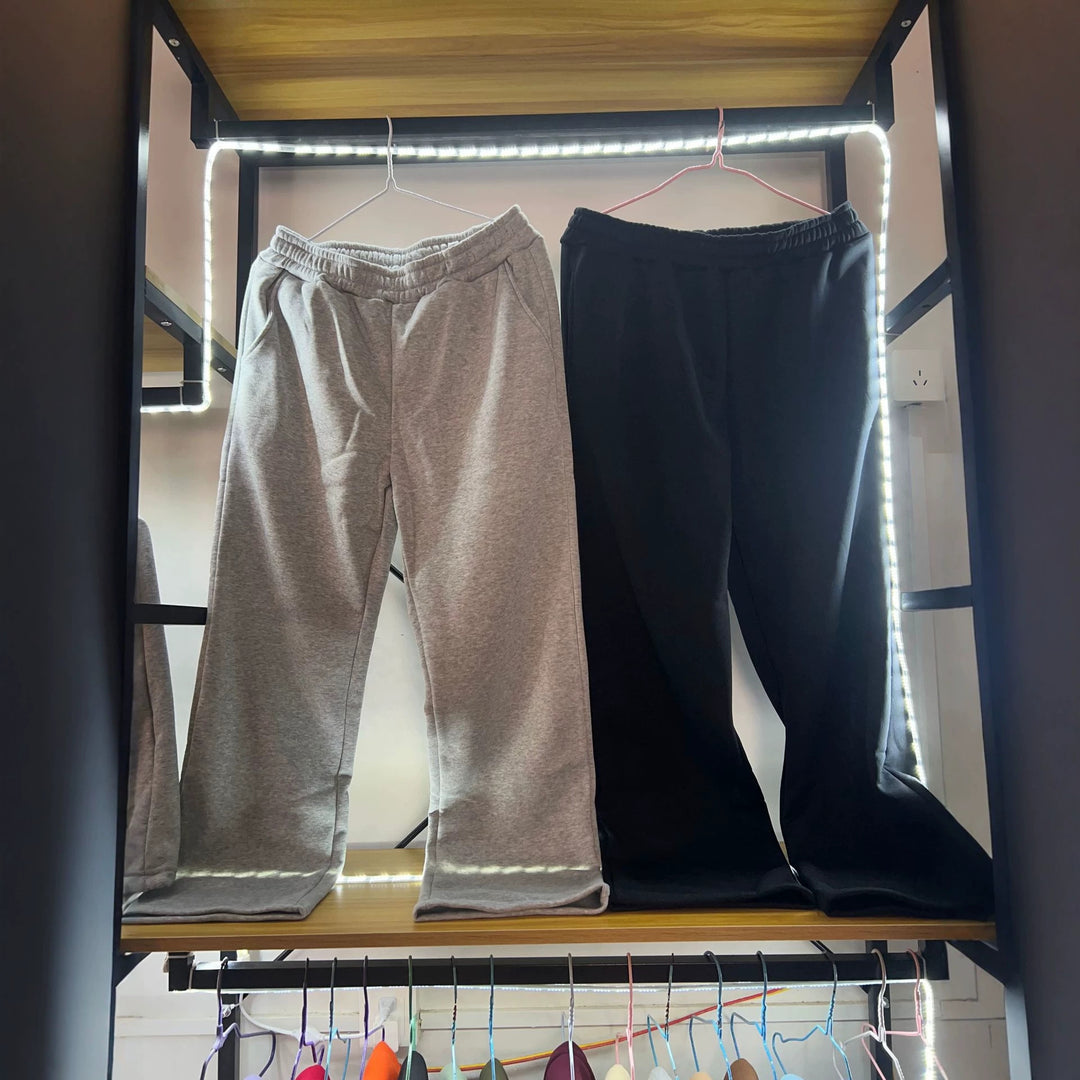 Women's loose lounge pants with elastic waistband, side pockets, and flowing leg Mune Fashion