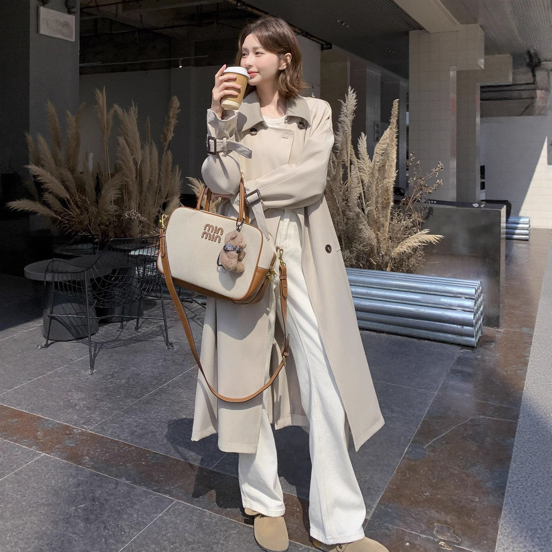 Women Long Cut Minimalist Trench Coat with Soft Fall, Dropped Shoulders and Adjustable Sleeve Straps Mune Fashion