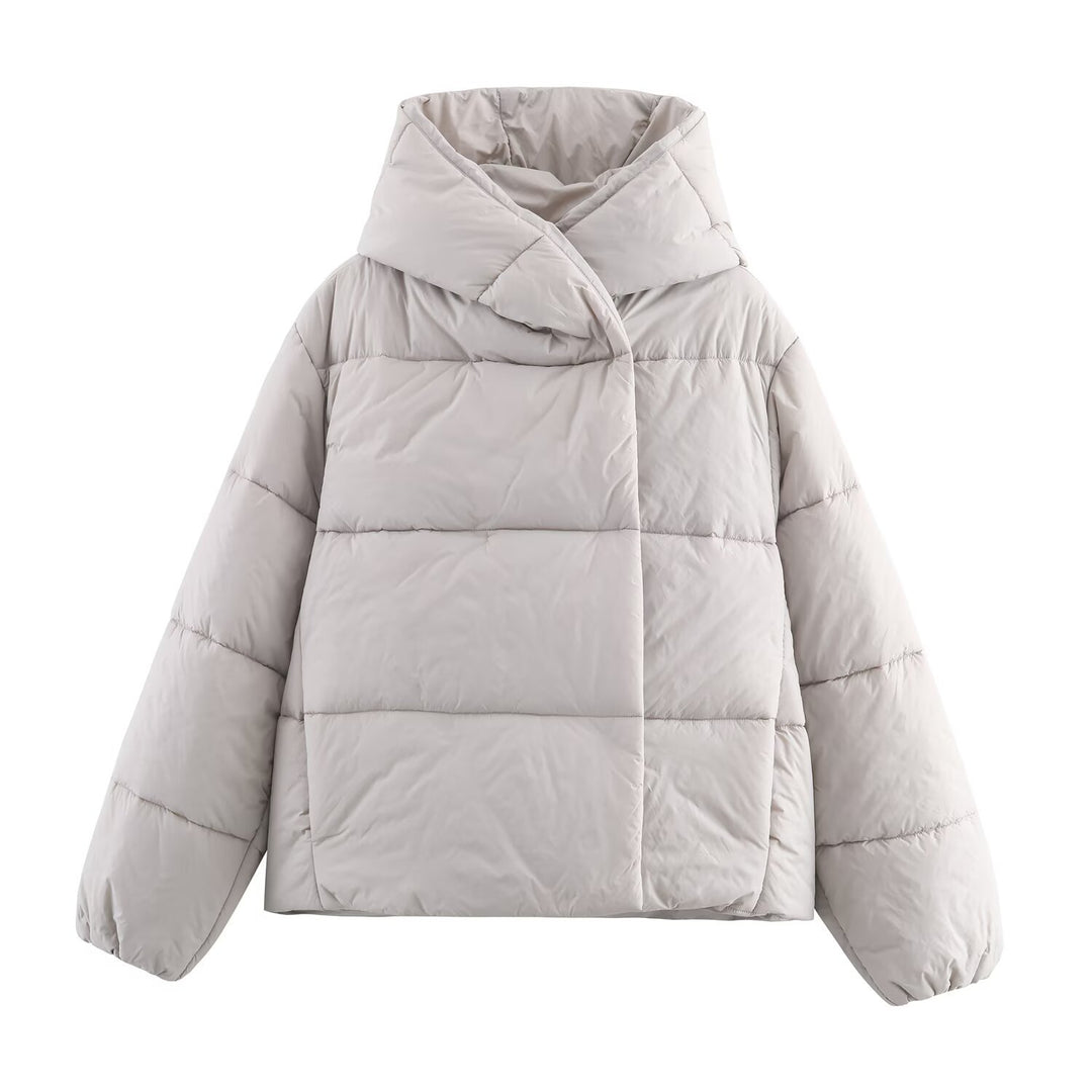 Women short cut oversized quilted jacket with high wrap collar and padded lining Mune Fashion