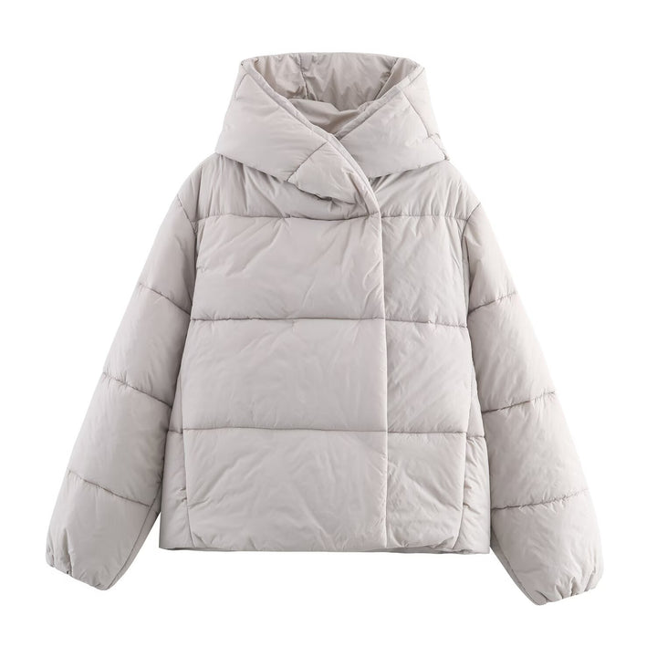Women short cut oversized quilted jacket with high wrap collar and padded lining Mune Fashion