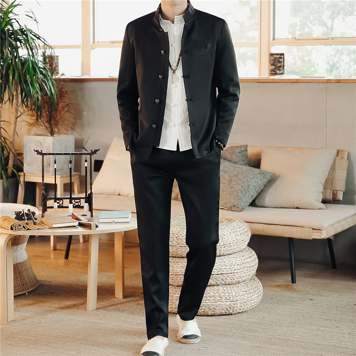 Men's Asian-inspired Mandarin jacket with stand-up collar, knot button placket, and tonal embroidered emblem Mune Fashion