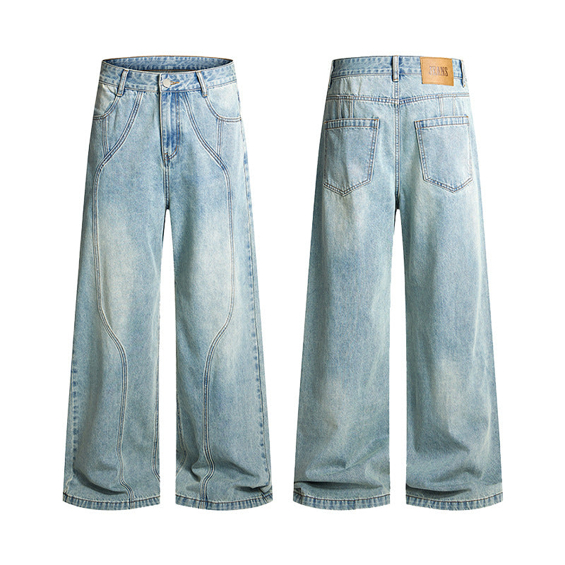 Men's wide-cut denim palazzo pants with curved seam panels and extra-long hem Mune Fashion
