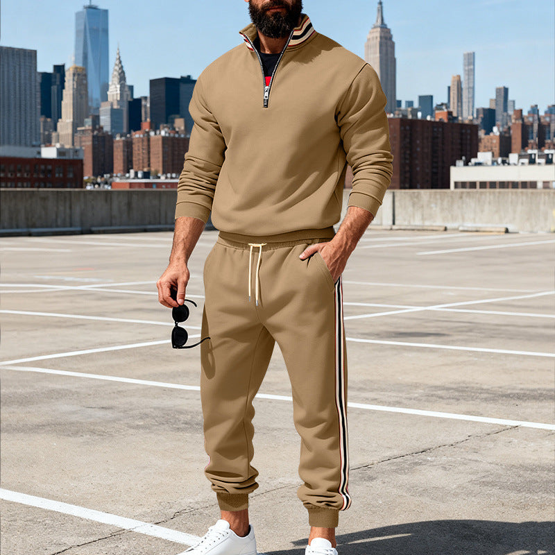 Men's stylish tracksuit set with half-zip, striped side stripes, and tapered jogger pants Mune Fashion