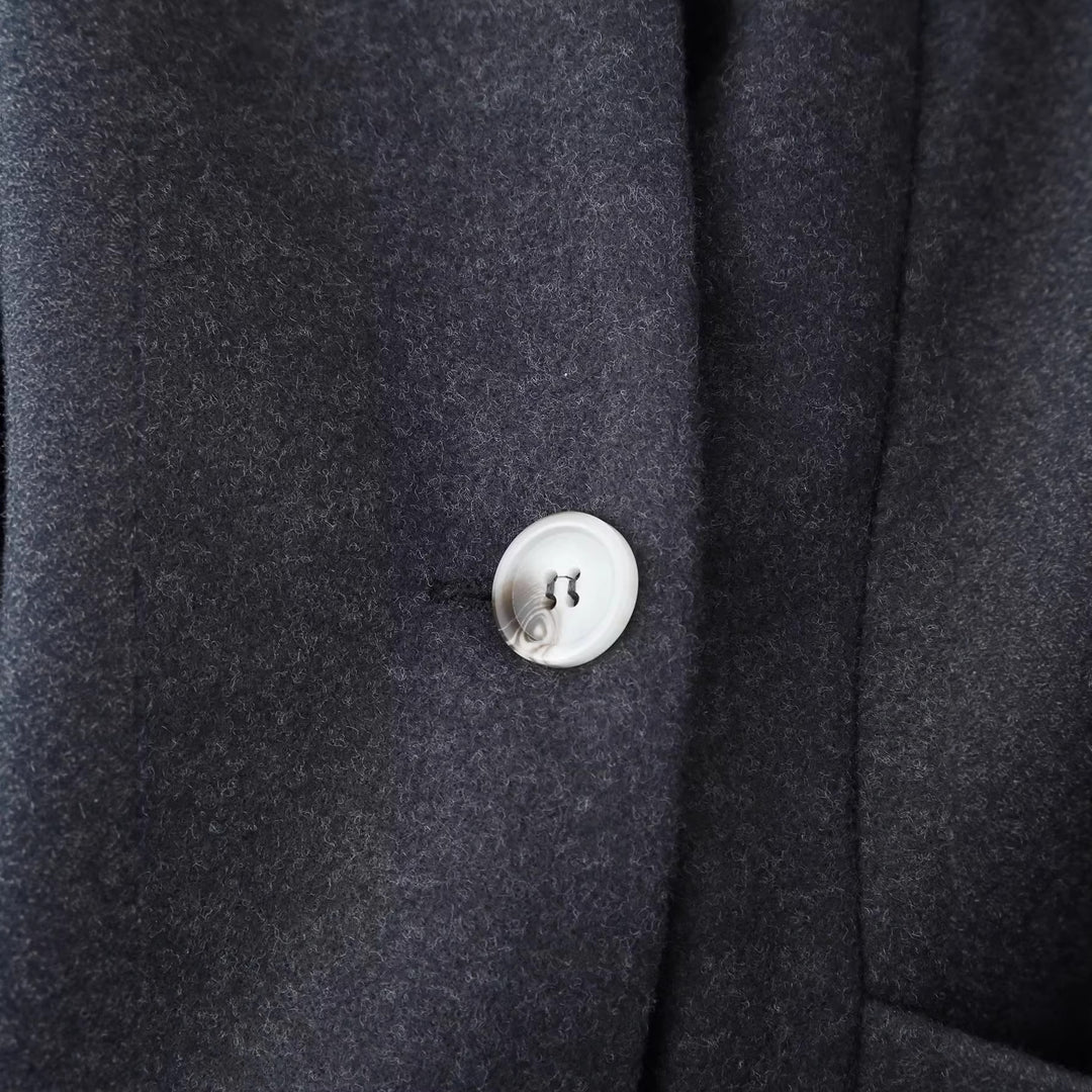 Women's elegant long-cut coat with shawl collar, tailored princess seams, and concealed single-button front Mune Fashion