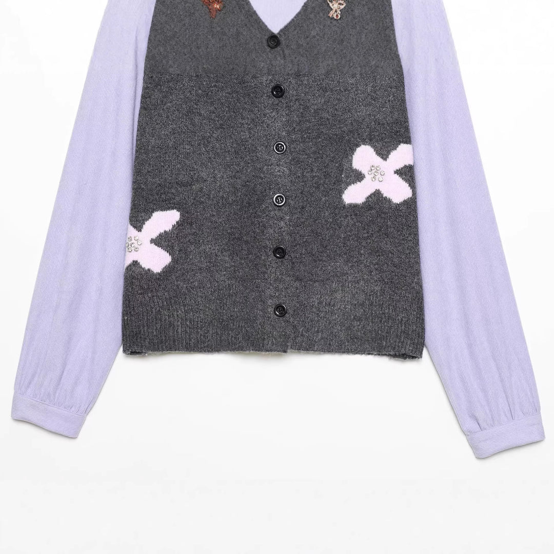 Women's knitted cardigan with decorative flower appliqué and contrast sleeves Mune Fashion
