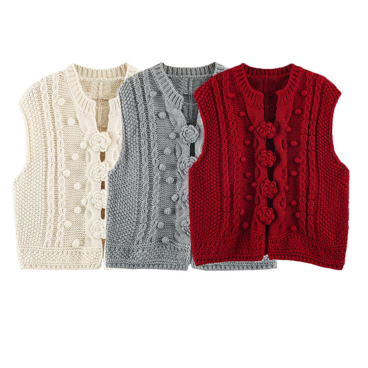Women's knitted vest with cable pattern, flower appliqués and bobble texture Mune Fashion