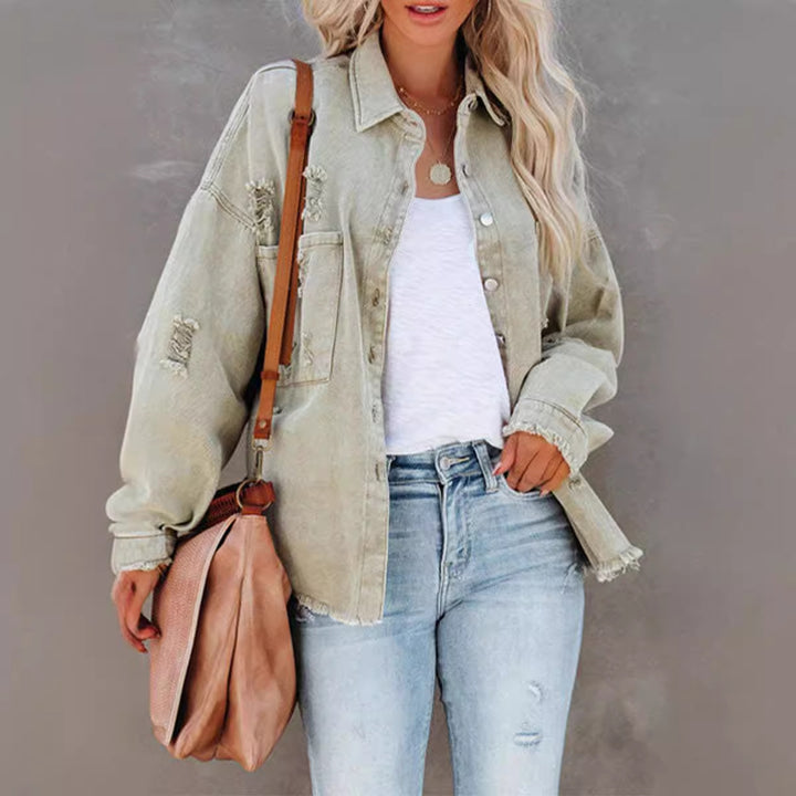 Women's oversized denim jacket with fringes, distressed details and press studs Mune Fashion