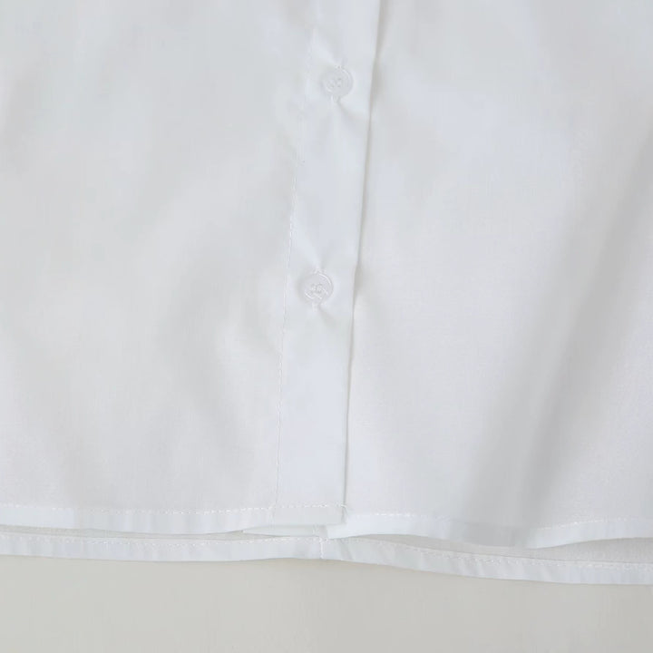 Women's loose-fitting shirt blouse with palm sequins, shirt collar and pearl detail Mune Fashion