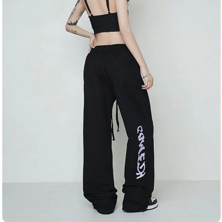 Women's loose lounge pants with elastic waistband, drawstring and distinctive side graphic print Mune Fashion