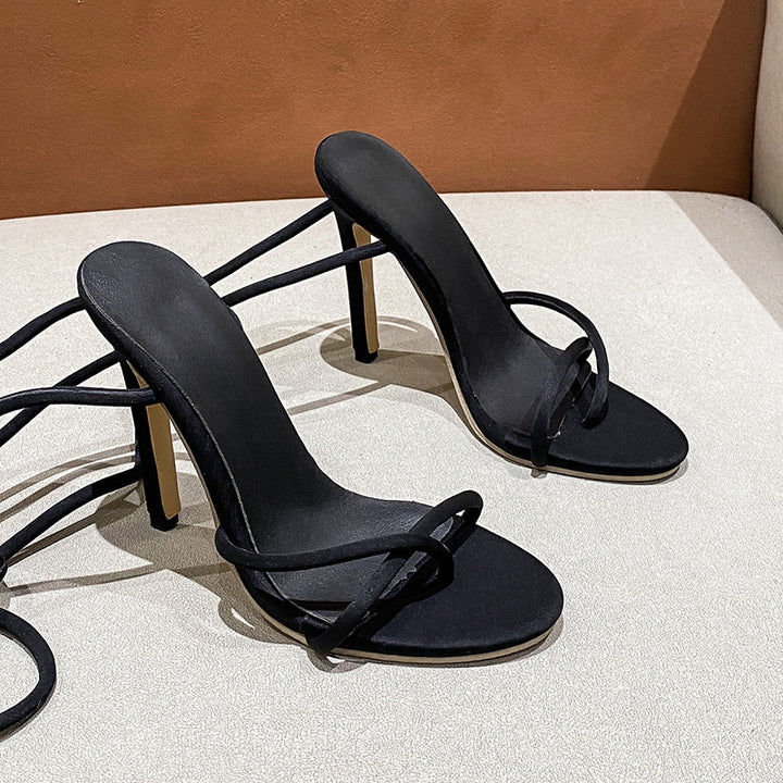 Women's ankle strap sandals with twisted lace straps, slim stiletto heel, and padded comfort footbed Mune Fashion