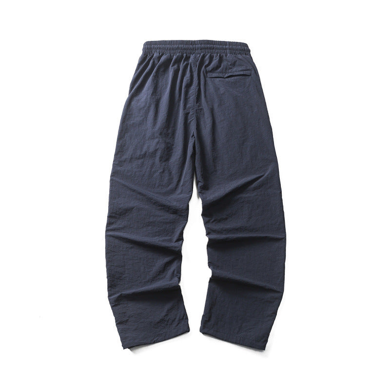 Men's Lightweight Cargo Casual Pants with Drawstring Waistband, Reflective Details, and Adjustable Leg Openings Mune Fashion