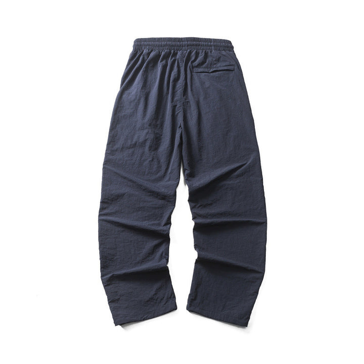 Men's Lightweight Cargo Casual Pants with Drawstring Waistband, Reflective Details, and Adjustable Leg Openings Mune Fashion