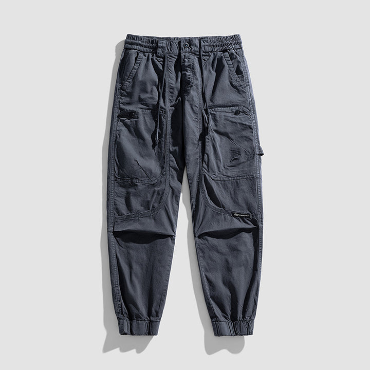Herren Konisch geschnittene Utility-Cargohose mit Tunnelzugbund, Kniepaneelen und Knöchelbündchen Mune Fashion