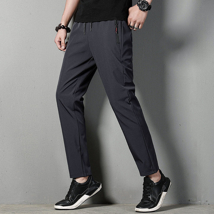 Men's narrow-fitting tech chino joggers with elastic drawstring waistband, concealed zip pockets, and pre-shaped knees Mune Fashion
