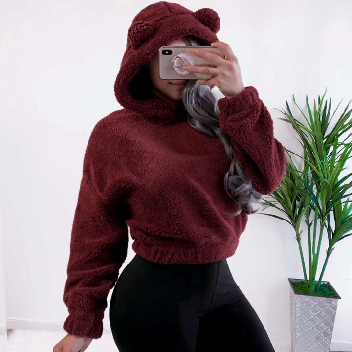 Women's Short Hooded Sherpa Pullover with Kangaroo Pocket and Elastic Hem Mune Fashion